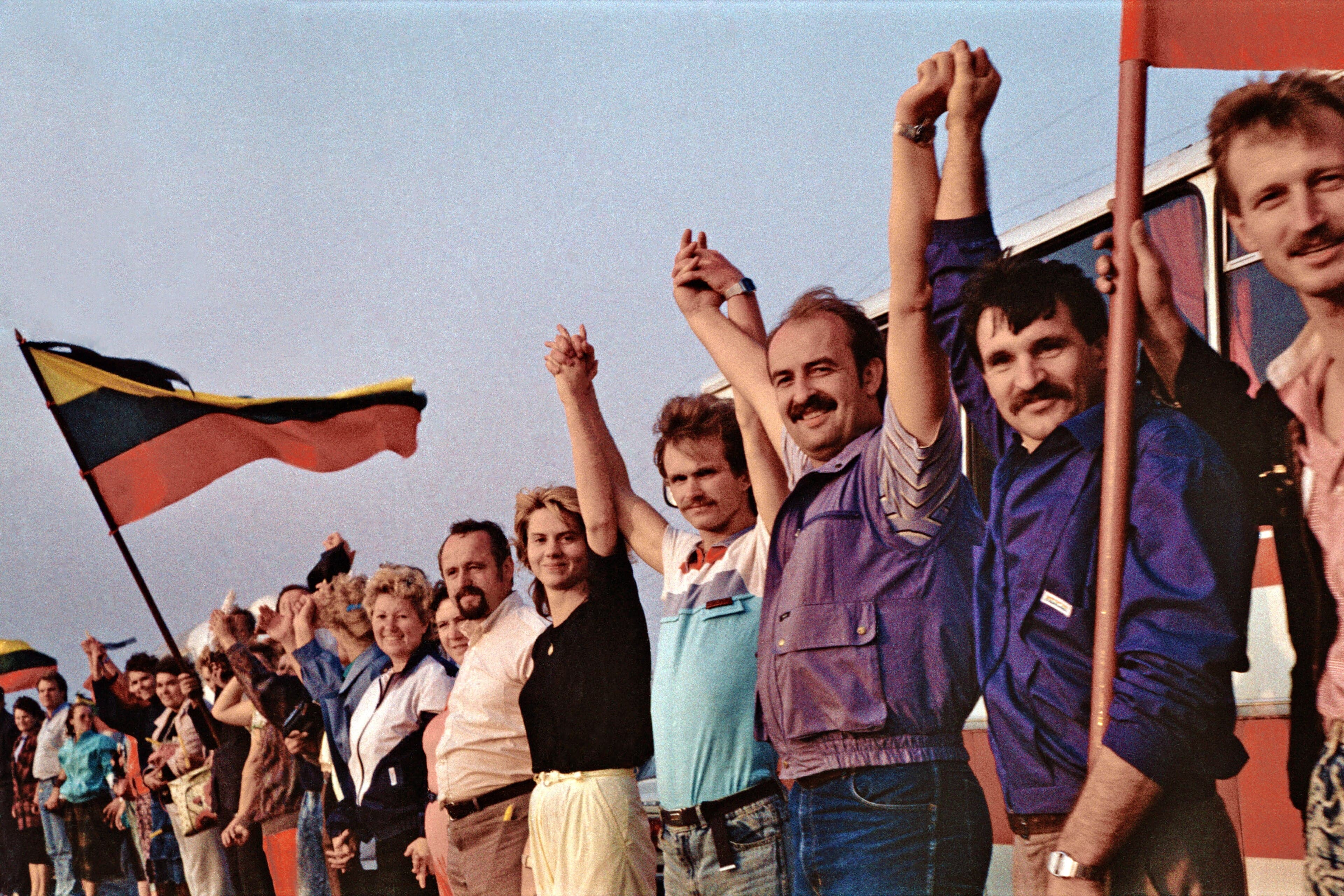 People holding hands with Lithuanian flags during the Baltic Way, 1989